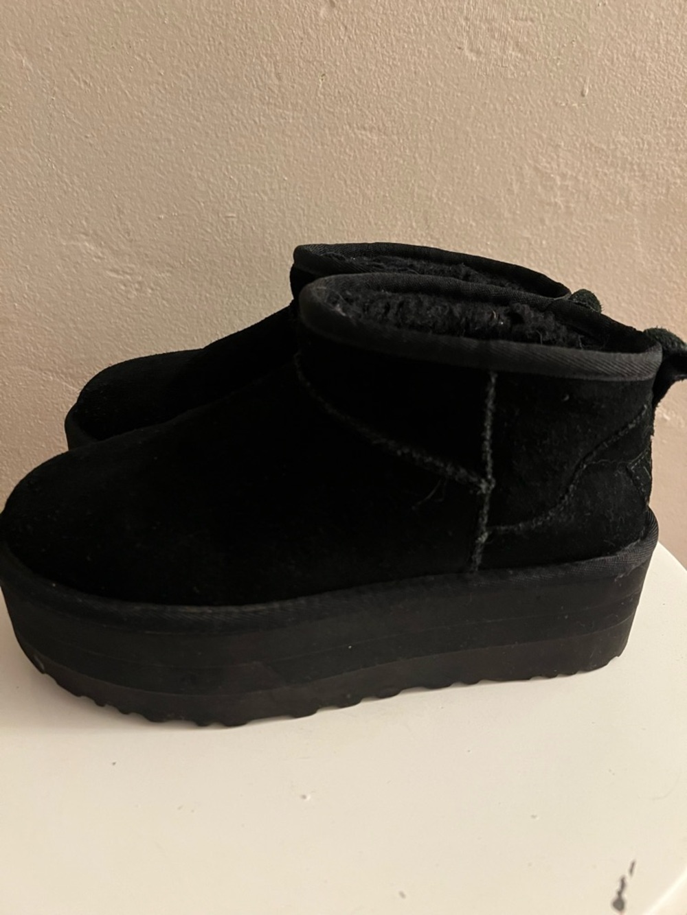 UGG Women's Classic Ultra Mini Platform boots in black suede. Size 7.